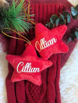 Make your Christmas tree uniquely yours with a personalized fabric star ornament, custom-made with one name. This timeless star decoration is ideal for baby&rsquo;s first Christmas, crafted in high-quality fabric for long-lasting charm. Available in grey, pink, blue and red.