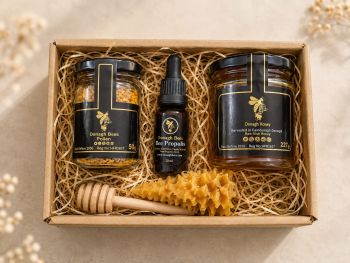 Delight someone special this holiday season with the&nbsp;Christmas Gift Box 0&nbsp;&ndash; a unique gift that celebrates nature's finest treasures from the hive. This curated set includes a selection of our premium bee products, crafted to bring warmth, wellness, and festive charm.
What&rsquo;s Inside:

Wildflower Honey Jar&nbsp;&ndash; Pure, raw wildflower honey, naturally sweet and full of flavor, perfect for holiday baking, morning teas, or a delightful treat on its own.
Bee Pollen Jar&nbsp;&ndash; A nutritious superfood packed with vitamins, minerals, and protein, ideal for adding a natural boost to smoothies or yogurt.
Propolis Dropper&nbsp;&ndash; Known for its immune-supporting properties, this propolis tincture is a go-to for wellness during the colder months.
Beeswax Christmas Tree Candle&nbsp;&ndash; Handcrafted from pure beeswax, this charming Christmas tree candle adds a warm, natural glow to any holiday decor, releasing a gentle honey aroma when lit.

Product Highlights:&nbsp;Beautifully packaged, this gift box brings together the finest bee-sourced products, perfect for anyone who values health, nature, and a touch of holiday cheer. Ideal for gifting to family, friends, or coworkers, the&nbsp;Christmas Gift Box 0&nbsp;is a thoughtful way to spread warmth and wellness this season.
Give the gift of nature with&nbsp;Christmas Gift Box 0&nbsp;&ndash; a celebration of health, taste, and holiday spirit!