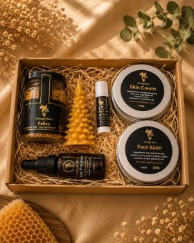 A thoughtfully curated gift box filled with natural bee-derived products for a luxurious self-care experience. This beautiful box includes:

Beeswax Skin Cream: Nourish and hydrate with a natural beeswax-based skin cream, perfect for a soft and smooth complexion.
Foot Balm: Soothe tired feet with this restorative balm, blending beeswax and essential oils for deep moisturization.
Lip Balm: All-natural beeswax lip balm to keep lips soft and protected in any weather.
Bee Pollen Jar: A jar of nutrient-rich bee pollen, a superfood to enhance energy and vitality.
Bee Propolis Dropper (20ml): Immune-boosting propolis drops, packed with antioxidants for daily wellness.
Christmas Tree Beeswax Candle: A festive, handcrafted beeswax candle in a charming Christmas tree shape, perfect for cozying up your home.

Beautifully packaged, this gift box makes an ideal present for anyone who appreciates nature-inspired wellness and supports sustainable, bee-friendly products.