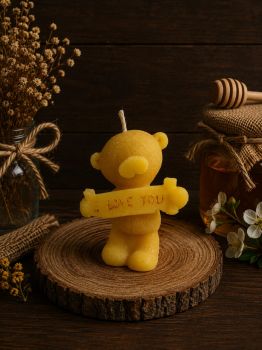 Light up someone&rsquo;s day with our adorable&nbsp;I LOVE YOU Bear Beeswax Candle! This charming bear-shaped candle is crafted from 100% pure beeswax, exuding a gentle, honey-like aroma that soothes the senses and warms any space. Standing at 85mm tall and 60mm wide, this little bear is the perfect way to say &ldquo;I love you&rdquo; while adding a touch of whimsy to any setting. With a burn time of approximately 6 hours, it offers just the right ambiance for cozy evenings, heartfelt moments, or as a thoughtful gift.

Dimensions:&nbsp;85mm (height) x 60mm (width)
Weight:&nbsp;62g
Burn Time:&nbsp;6 hours
Material:&nbsp;100% Pure Beeswax (Eco-friendly and Non-Toxic)
