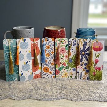 Laminated, handmade, colourful bookmarks.