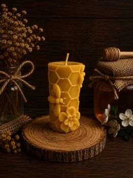 Add a touch of nature&rsquo;s charm to your space with our&nbsp;Honeycomb Column with Bee Candle, made from 100% pure beeswax. This beautifully crafted candle features a delicate honeycomb texture and a decorative bee motif, making it both a functional light source and a delightful piece of decor.

Dimensions: 85mm height x 50mm width
Weight: 116g
Burn Time: Approx. 30 hours

Enjoy the natural honey scent and clean, toxin-free burn. Perfect for cozy evenings, special occasions, or as a thoughtful gift for nature lovers. Illuminate your home with the essence of the hive.