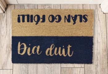 Dia duit - Slán Go Fóill meaning “Hello - Goodbye”  (direct translation, God be with you - Goodbye for now) is part of our As Gaeilge doormat range. 
Add some of the beautiful Gaeilge language to your home, it’s the perfect way to greet you or your guests every day! Our doormats also make wonderful gifts for Housewarmings, Weddings, Birthdays, Christmas or "just because".
All of our products are hand-painted and made to order with love just for you.
Go Raibh Maith Agat!
