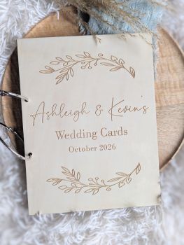 Preserve precious birthday memories with our Personalized Birthday Card Keeper, a practical yet elegant keepsake crafted from 3mm basswood. Featuring engraved designs and personalized with names or an optional date, this card keeper is a meaningful way to celebrate special moments year after year. Choose from five beautiful designs or request a custom design for a truly one-of-a-kind keepsake.
Designed for easy use, the card keeper includes two large 63mm binder rings, allowing you to store and flip through your cherished cards effortlessly. Add an extra personal touch with an optional heartfelt message engraved on the back for a small additional fee. Whether it&rsquo;s for yourself or as a thoughtful gift, this card keeper is perfect for commemorating birthdays and special milestones.