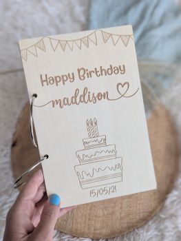 Preserve precious birthday memories with our Personalized Birthday Card Keeper, a practical yet elegant keepsake crafted from 3mm basswood. Featuring engraved designs and personalized with names or an optional date, this card keeper is a meaningful way to celebrate special moments year after year. Choose from five beautiful designs or request a custom design for a truly one-of-a-kind keepsake.
Designed for easy use, the card keeper includes two large 63mm binder rings, allowing you to store and flip through your cherished cards effortlessly. Add an extra personal touch with an optional heartfelt message engraved on the back for a small additional fee. Whether it&rsquo;s for yourself or as a thoughtful gift, this card keeper is perfect for commemorating birthdays and special milestones.