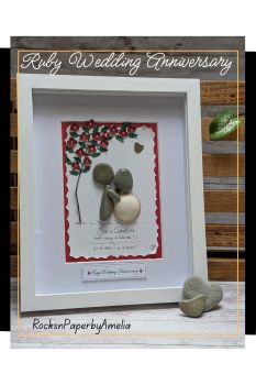 Celebrate a love that has blossomed over four decades with this exquisite Ruby Wedding Anniversary pebble art.Each piece is a testament to enduring affection, featuring a couple in a tender embrace beneath a tree adorned with red ruby paper flowers&mdash;symbolizing 40 years of shared memories. The artwork is brought to life with a fallen branch and dark green leaves, adding a touch of nature&rsquo;s serenity.Handpicked pebbles from the beautiful beaches of Ireland represent the couple&rsquo;s strong foundation, while the girl is delicately crafted from a beautiful beach shell, capturing the unique journey of love.Personalize this heartfelt creation with your chosen names and a special date, making it a one-of-a-kind memento. Select from a variety of background colors and frame options to match your decor and commemorate this milestone anniversary in style.A treasure trove to give them on their anniversary.Made to order only, this picture comes on a frame of approximately 9x11 inches. It can be wall hanged or rested on a table.
Based in Carrigaline, East Cork - Ireland, I ship worldwide. If your destination country is not listed, please contact me and I'll give you a quote for the shipping charges to your specific location.All pieces are my own design and created with a lot of love using natural materials collected on my walks along the beautiful Irish beaches and woods. Please visit my store RocksnpaperbyAmelia for more gift ideas.
https://www.shopinireland.ie/sellers/rocks-and-paper-by-amelia
Thank you for supporting my handmade store.AmeliaP.S. If you have any queries, would like a customised item or wish to contact me, please do so by pm and I'll be happy to assist.