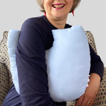 * This is my post mastectomy/lumpectomy/upper chest surgery sleep support pillow is ideal for use directly after surgery, in the following weeks while healing takes place.
* This support cushion is shaped to fit comfortably under the affected arm, and is filled with hollow polyester fibres to a fairly firm finish, not too hard or soft, perfect to provide support and comfort.
* This pillow reaches mid chest in width, so it will easily cover the surgery area.&nbsp;&nbsp;
* I am a breast cancer survivor myself so I understand how individuals undergoing chest surgery need to feel supported as healing occurs.&nbsp;
* It measures 43cm wide X 37cm long and 10 cm in depth. This plain dusky blue fabric is soft and breathable. All support pillows come with a I love handmade label. This pillow is reversible so it can be used on either side of the chest.
You can opt to add matching fabric ties to aid in support so it can be tied to the chest if desired.