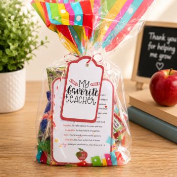 Teacher Gift - Teacher&rsquo;s Survival Kit. A fun Teacher gift and a one of a kind Teacher gift. The perfect keepsake to show how much you appreciate that special teacher. Sometimes, you just want to send &ldquo;just a little something&rdquo; to show someone that you care and that you&rsquo;re thinking of them. Our Survival Kit will do just that and help raise a smile (or shed a tear) too!!&nbsp;
❤ ALL CONTENTS INCLUDED
❤ A UNIQUE GIFT
❤ HANDMADE TO ORDER.
Presented in a beautiful bag, your handmade gift contains all of the listed items along with a cleverly designed card which highlights the significance of each item inside.
Teacher&rsquo;s Survival Kit
Candle..For when the children get on your wick
Tissue..To wipe away happy tears at the end of term
Seeds.. To sow the seeds of knowledge &amp; wisdom
Elastic Band..For when you&rsquo;re stretched to the limit
Google Eyes..An extra pair for the back of your head
Crayon..To make every day colourful
Ear Plugs..For when you can&rsquo;t hear yourself think
Marbles..To help replace the ones you lose
Paper Clip..To help hold it all together
Mint..You&rsquo;re worth a mint to the parents
Smarties..You have a class full of them
Tea Bag..Relax put your feet up.. You deserve it :-)
&nbsp;