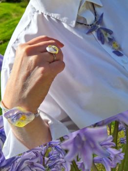 A handmade resin jewelry set with real Irish wildflowers – includes a necklace, adjustable bracelet, and ring. Unique and nature-inspired.