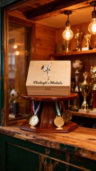 Personalised Martial Arts Medal box, with option to put club crests on box.&nbsp; Choose male or female martial arts figure, hair colour and kit and belt colour. Box is finished with a non toxic wax.
The dimensions of the box are 29cm x 18cm x 13cm a very generous size to store all your well earned medals.
The ideal gift for any martial arts fanatics with a medal haul and nowhere to store them. Leave them speechless with this personalised keepsake box, something they will have to cherish their medals . These personalised martial arts keepsake boxes are the perfect gift for a birthday, mothers day, fathers day, communion, confirmation or Christmas present. A truly unique gift.