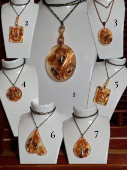 Golden-toned handmade pendant with real dried flowers and bronze chain. Price per 1 pendant.