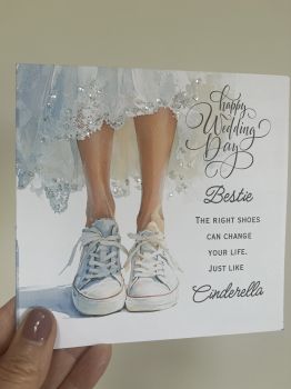 For the woman who loves her sneakers and will be rocking them as she walks down the aisle, this&nbsp;beautifully handmade trinket card&nbsp;is the perfect keepsake. Designed with&nbsp;glitter detail on the lace dress&nbsp;and the bride&rsquo;s iconic&nbsp;sneakers proudly on display, it&rsquo;s a heartfelt and unique way to celebrate her big day.
You can&nbsp;personalize the title&nbsp;with options like&nbsp;Bestie,&nbsp;Best Friend, or the bride&rsquo;s name for that extra-special touch.


Size:&nbsp;6x6 inches


Material:&nbsp;Quality card stock


Occasion:&nbsp;Wedding Day &ndash; perfect for the modern, unique bride


Keepsake: A card she&rsquo;ll treasure forever


