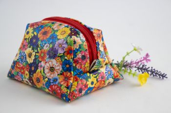 Handmade Cosmetic Bag. Beautiful vibrant floral patterned faux leather.
Made with love, unique, ideal and affordable handmade gift for Christmas, birthday, rthank you gift for teachers, etc.
Approx. size 19cm long x 13 cm wide x 13cm high.
To clean it just wipe with a damp cloth. Not machine washable.
Thanks for reading!
