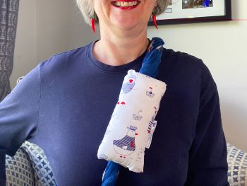 These are chemotherapy port support pillows made using soft cotton fabric. Each pillow is filled to medium firmness for comfort. There is a large flap with two sets of velcro fastenings. The velcro will enable to the pillow to be attached to a chosen area.&nbsp;&nbsp;
I've used this Navy and red themed seabirds, lighthouses print for this pillow, with a handmade with love by Rodgersonhandcraft label.
This support pillow is ideal for use directly after chemotherapy, or if the area feels tender.&nbsp;