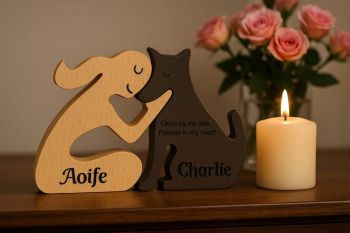 A beautiful personalised wooden ornament memory of a treasured pet with their owner, engraved names on both figurines. &nbsp;A unique gift idea for the family and the animal lover. &nbsp;