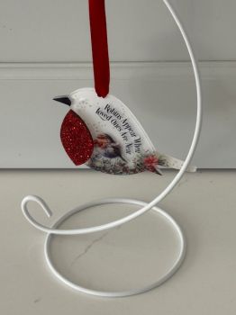 Beautifull Acrylic memorial robin with glitter red breast.
Measures 10cm, supplied with a red satin ribbon and gift box.
A name can be added to the red breast.