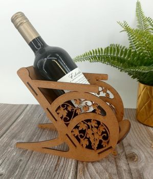 Showcase your favorite bottle of wine in style with our beautifully crafted laser-cut wooden wine stand. Designed with precision and made from high-quality wood with a natural oak veneer finish, this stand adds a touch of elegance to any kitchen, dining room, or bar.