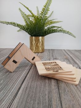 Set of 5 stylish engraved wooden coasters with matching holder. A perfect addition to your kitchen counter or home bar, combining practicality with elegant design.
