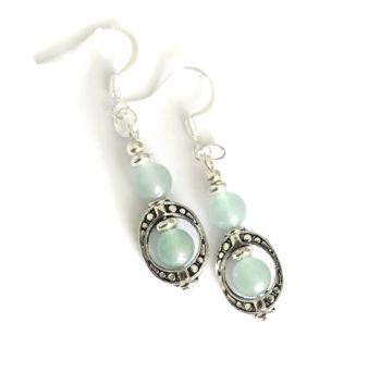 Beautiful handmade earrings, created with antique silver frames, silver plated beads and gorgeous natural aventurine gemstones. They are suspended from silver plated, nickel free ear wires These earrings are light and comfortable to wear&hellip; showcase your indivuality with these bespoke beauties! They arrive in a pretty organza bag, and, have free shipping! Aventurine, a type of quartz, is believed to offer a range of healing and positive effects, both physically and emotionally. It is often associated with luck, prosperity, and emotional balance. It is thought to calm anxiety, promote creativity and encourage compassion.