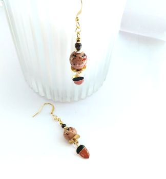 Introducing ... autumnal earrings, created with gold plated, enamelled acorn drops, gold plated beads, painted glass beads in autumnal colours, and beautiful natural garnet beads. They are suspended from gold plated, nickel free ear wires.&nbsp; (suitable for sensitive ears).&nbsp; Gorgeous, lightweight, easy to wear and bespoke... Elevate your look this autumn with these cuties!&nbsp; &nbsp;They arrive in a pretty organza bag, and.. have free shipping!