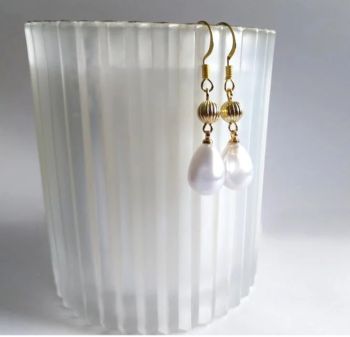 Presenting ... beautiful earrings… created with lustrous glass pearls, gold plated beads and earwires. The earwires are nickel free and suitable for sensitive ears. Beautifully elegant earrings for all your special occasions.. they are also light and comfortable to wear…. elevate your style with these bespoke beauties… They arrive in a pretty organza bag... and have free shipping!