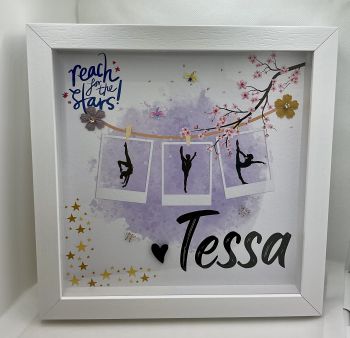 Gymnastic frame with girl's name.