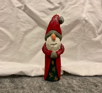 Santa, hanging ornament. 2 design options. Hand-carved from basswood, individual variations in wood, shape and texture will occur. Hand-painted using non-toxic acrylic paint. Size approximately 10 cm x 2.5cm.