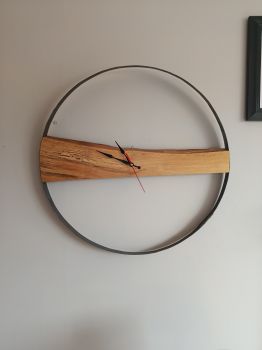 Handmade barrell ring wall clock, battery operated.