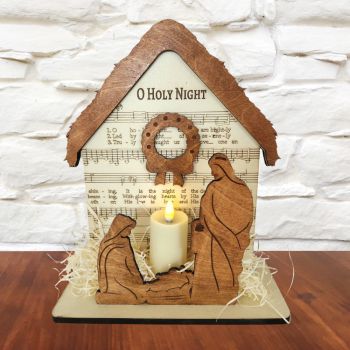 🎄&nbsp;Wooden Christmas Decoration with Candle
Bring the spirit of Christmas into your home with this beautiful wooden decoration. It features a peaceful nativity scene and a battery-operated candle that gives off a gentle glow. The sheet music to O Holy Night is carefully engraved in the background.
&middot;&nbsp;&nbsp;&nbsp;&nbsp;&nbsp;&nbsp;&nbsp;&nbsp;Size: 26cm high &times; 22cm wide &times; 9cm deep.
&middot;&nbsp;&nbsp;&nbsp;&nbsp;&nbsp;&nbsp;&nbsp;&nbsp;Handcrafted from wood.
&middot;&nbsp;&nbsp;&nbsp;&nbsp;&nbsp;&nbsp;&nbsp;&nbsp;Soft, warm candlelight adds a cozy feel.
Perfect for shelves, mantels, or as a special gift.
Requires 2 AAA batteries.
&nbsp;