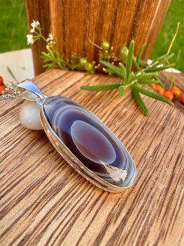High polished oval Botswana Agate Sterling Silver Necklace
Metal: Sterling SilverGem: Natural Botswana AgateAgate Size: 35mm x 15mm
&nbsp;