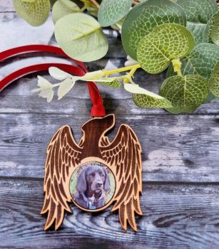 Beautiful wooden Angel personalised with your cat or dogs photo. Adorned with red ribbon packed in a pretty velvet bag.