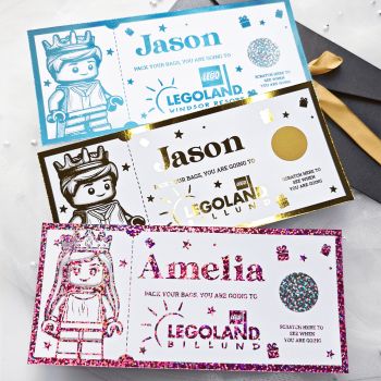 Legoland Surprise Foil Ticket | Personalised Keepsake
Make their day magical with a personalised Legoland foil ticket handmade in Ireland. Featuring shimmering foil, kraft envelope, and optional scratch-off reveal, this keepsake is the perfect way to announce a family adventure or surprise trip.
How to Order


Enter the&nbsp;name,&nbsp;event details,&nbsp;date, and&nbsp;personal message.


You can choose your preferred&nbsp;foil color&nbsp;and&nbsp;envelope option.


Please double-check all information before placing your order to make sure it's correct.



Important Notes


All details must be correct at the time of ordering. We'd like to carefully review everything before submitting to avoid delays or printing errors.


This is a&nbsp;keepsake gift&nbsp;and&nbsp;does not grant entry&nbsp;to any real event.


Each ticket is securely shipped in a&nbsp;rigid, hard-backed envelope&nbsp;to ensure it arrives in perfect condition.


If you have any special requests or require fully custom designs, please don't hesitate to&nbsp;contact us.

