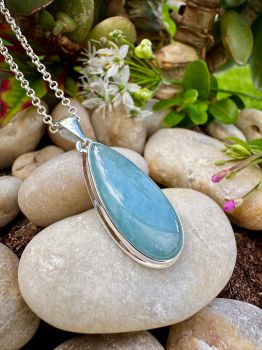 This beautiful Aquamarine set in Silver Necklace is handmade and perfect for a special birthday gift. It is made with sterling silver and has a great price. It is a stunning piece of jewelry that will bring joy and happiness for many years to come. It is the perfect way to show your love and appreciation.