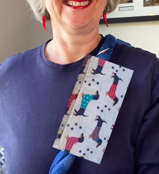 These are chemotherapy port support pillows made using soft cotton fabric. Each pillow is filled to medium firmness for comfort. There is a large flap with two sets of velcro fastenings. The velcro will enable to the pillow to be attached to a chosen area.&nbsp;&nbsp;
Each pillow can vary slightly as each are handmade. I've used this dachshunds in jumpers fabric for these pillows. I&rsquo;ve added a handmade with love by Rodgersonhandcraft tag too.
This support pillow is ideal for use directly after chemotherapy, or if the area feels tender.&nbsp;