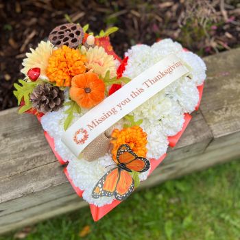 This heart grave wreath is a lovely tribute for a special loved one at Autumn for a funeral or Anniversary or Birthday memory.