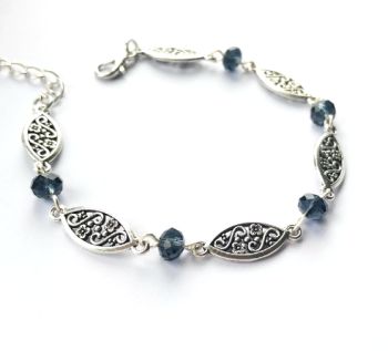 Handmade antique silver filigree bracelet, created with faceted glass beads in a deep navy, silver plated clasp and extension chain. The bracelet comes in two lengths .. (1) approx. 19.3cm/7.5ins plus extension chain approx. 3.8cm/1.5ins. (2) approx. 21.5cm/8.5ins, plus extension chain approx. 3.8cm/1.5ins. Elevate your style with this beautiful bespoke piece. It arrives in a pretty organza bag, and has free shipping!