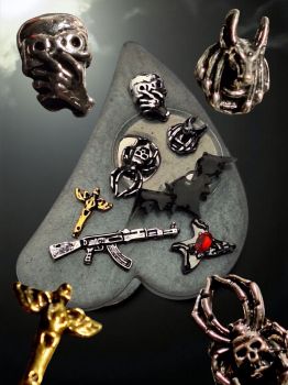 Dark and bold Halloween-themed brooch with spooky miniature elements set in resin.