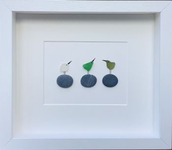 Three little birds sea glass art! Sea glass was hand picked from the beaches and rocks of Sandycove Co Dublin. Each piece is unique and handmade locally. Frames with glass fronts panel are sourced from Wicklow. Free postage in Ireland . Give a sustainable handmade Irish gift!