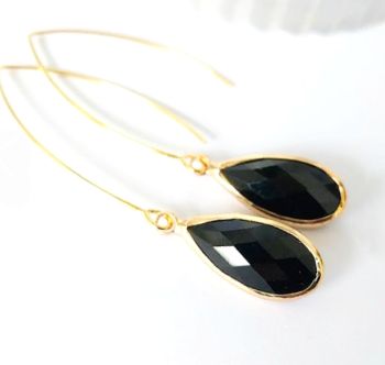 Beautiful earrings, created with gold framed, faceted glass beads in black, suspended from stainless steel ear wires in gold. The drop on these earrings is approx. 7.25cm/2.85ins. Gorgeous, sparkly and elegant.. perfect for special occasions.. Elevate your style with these beautiful earrings…. They arrive in a pretty organza bag, and have free shipping!