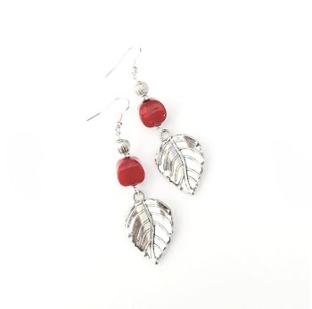 Handmade earrings, created with polished antique silver leaf drops, acrylic beads in a beautiful deep red, silver plated beads and ear wires. The ear wires are nickel free and suitable for sensitive ears. The drop on these earrings is approx. 5cm/2ins. Gorgeous, lightweight and comfortable to wear. Stand out and elevate your style with these bespoke beauties! They arrive in a pretty organza bag, and have free shipping!