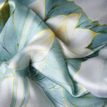 My Silk Ireland Collection of scarves are the finest quality 100% pure silk, luxuriously soft and shimmery with a beautiful drape. Beautiful soft warm yellow and white waterlilies are set against a background of soft, muted greens and shimmery silver greys.  
This is a colour palette of delicate pale hues that is very flattering and adds a touch of luxury to any occasion – a treasure to wear or to gift. 
Beautiful Gift Box with ribbon: Each scarf comes hand-packaged in a lovely gift box with a ribbon, sent with love from my Dublin studio.
100% Pure Silk:  All the scarves in my Silk Ireland Collection are a generous 180 x 45 cm size and made from the finest 100% pure Mulberry silk with a hand-rolled hem.  They brighten up any outfit and are a must-have statement piece.
A Perfect Gift: My scarves are unique and original designs, one of a kind, and make precious gift for mums, aunts, friends, grandmothers and a special gift for yourself. – a thoughtful and treasured gift
 