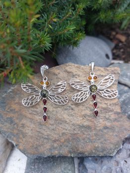 These large Sterling Silver dragonflies are set with different colours of Amber. They have a stud fitting. There is a matching pendant available.