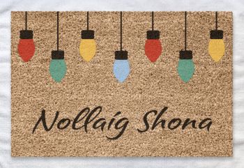 Nollaig Shona meaning “Happy Christmas” is part of our As Gaeilge doormat range. 
Add some of the beautiful Gaeilge language to your home, it’s the perfect way to greet you or your guests every day! Our doormats also make wonderful gifts for Housewarmings, Weddings, Birthdays, Christmas or "just because".
All of our products are hand-painted and made to order with love just for you.
Go Raibh Maith Agat!