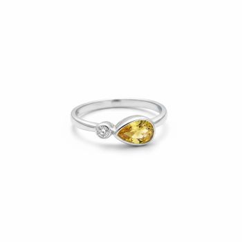 Brilliant cut Citrine bezel set in Sterling Silver Ring
Metal: Sterling Silver
Gem: Citrine, Clear Cubic Zirconia
Citrine Size: 7mm x 4mm
Birthstone: November