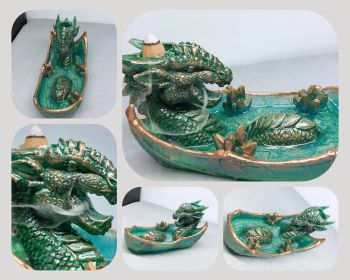 Create a calming and magical atmosphere with this stunning koi dragon backflow incense holder. Designed as a dragon resting in a pond surrounded by some crystals.
When used with backflow incense cones (cone must be raised by a little wire), the smoke gently flows from the dragon&rsquo;s mouth, cascading downward like a mystical mist.
Handcrafted with care, this incense holder is made from resin, allowing for intricate textures and a smooth, durable finish.&nbsp;
Perfect for meditation spaces, relaxation areas, or as a thoughtful gift for lovers of fantasy decor and aromatherapy.
🌟 If Custom Made chosen, let me know what colors would you like it made with
🌟 Allow some color difference