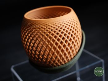 

Elevate your orchid game with this cheeky geometric planter that's as stylish as it is practical. Designed by h3li&Oslash; and 3D printed to perfection, the Polygon Orchid features a sleek minimalist design with clever wrap-around support that keeps your plant sitting pretty and breathing easy. Choose between the bold 100mm statement piece or the compact 80mm sidekick, and pick from a rainbow of colour options to match your vibe. Form meets function in the most delightfully modern way.