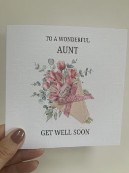 🌸 Personalised Get Well Soon Bouquet Card 🌸
Brighten someone&rsquo;s day with this&nbsp;beautiful handmade Get Well Soon card, designed to bring comfort, cheer, and a touch of elegance.
Each card features:💐 A stunning floral bouquet design✨&nbsp;Subtle glitter detailing&nbsp;for a gentle sparkle🎀 Finished with a&nbsp;soft pink ribbon&nbsp;for an extra touch of charm🩷 Printed on a&nbsp;6x6 luxury linen-textured cardstock&nbsp;for a premium feel🏷️&nbsp;Personalised name tag&nbsp;&ndash; add your chosen name and title (e.g.&nbsp;Aunt, Mam, Friend, Sister,&nbsp;etc.) to make it truly unique
&nbsp;
Perfect for sending warm wishes and a heartfelt &ldquo;get well soon&rdquo; to someone special.