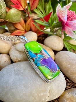 Multi Colors Copper Turquoise bezel set in Sterling Silver NecklaceMetal: Sterling SilverGem:&nbsp;Multi Copper TurquoiseStone Size: 32 mm x 18mm