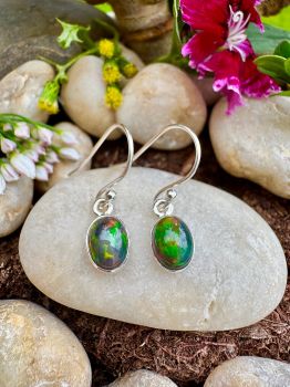 Genuine&nbsp;Chalama Black Opal Sterling Silver&nbsp;EarringsMetal: Sterling SilverGem: Genuine&nbsp;Australian Chalama Black OpalOpal Size: 8mm x 6mm