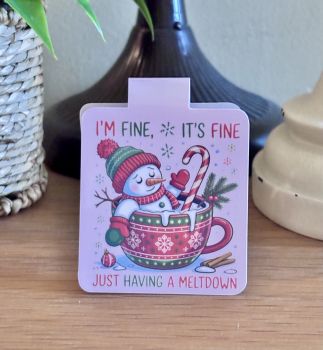 A cute and funny handmade magnetic bookmark featuring a snowman sitting in a festive mug with the text&nbsp;&ldquo;I&rsquo;m fine, it&rsquo;s fine&hellip; just having a meltdown.&rdquo; A perfect stocking filler or Secret Santa gift for any book lover.